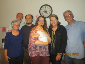Freya with her parents and both sets of grandparents